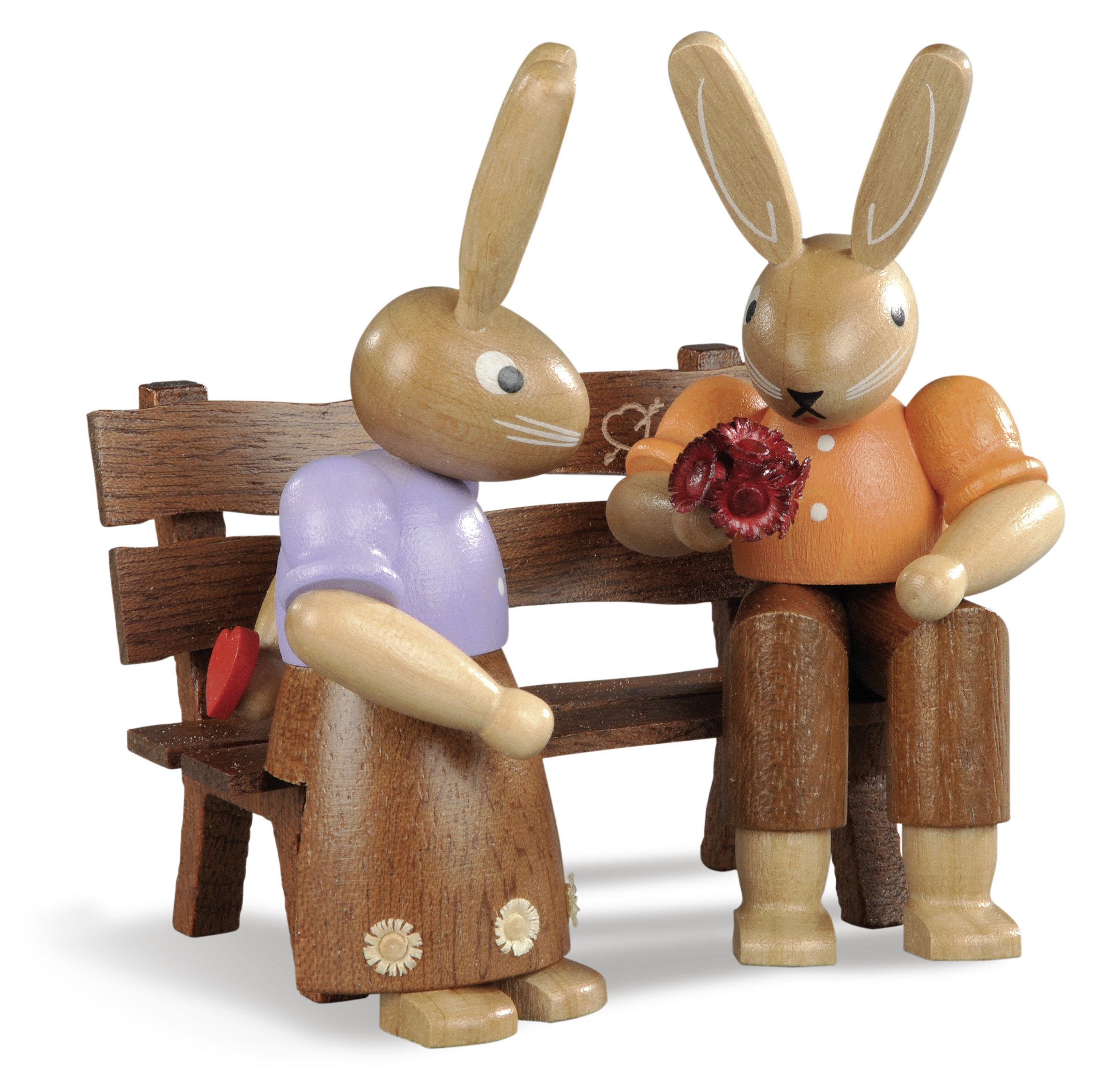 Hasenpaar auf Bank - farbig lasiert