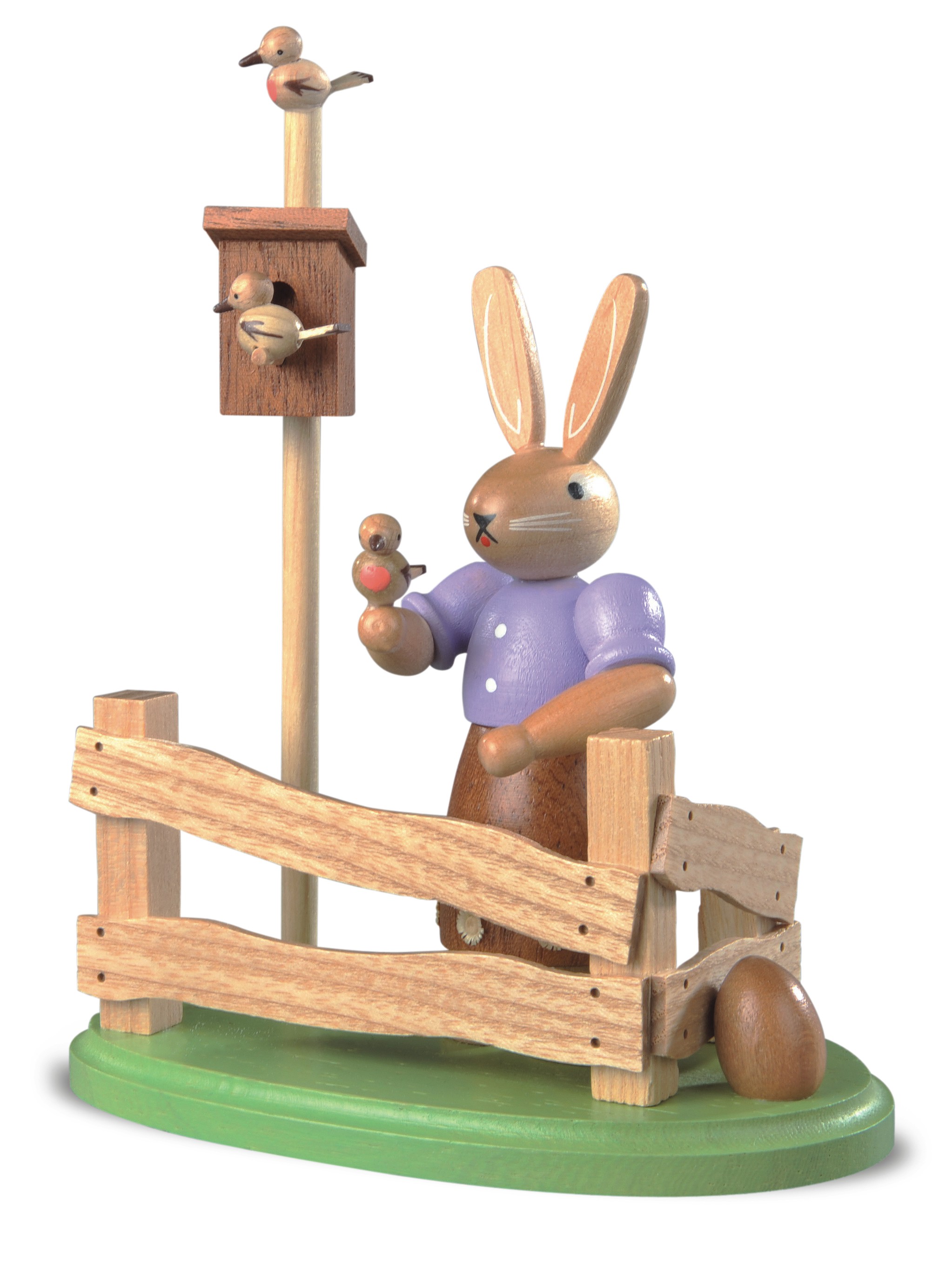 Hasenfrau am Gartenzaun - farbig lasiert